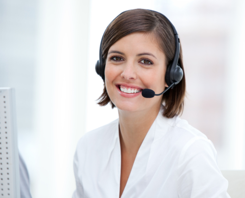 Portrait of a pretty customer agent at work